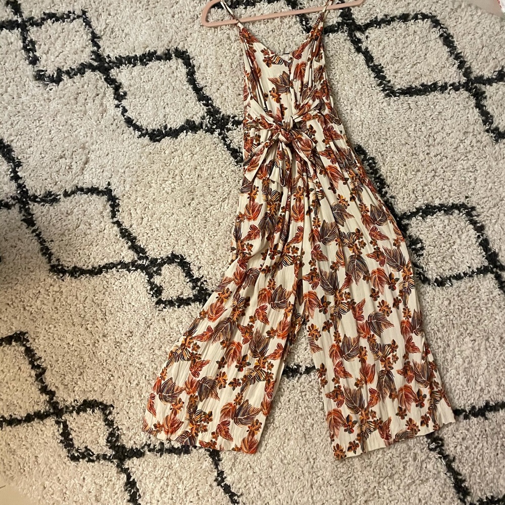 free people romper,a small hole on the bottom leg, but unnoticeable when worn